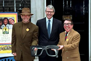 Suit Prints: ELTON JOHN, PRIME MINISTER JOHN MAJOR AND RONNIE CORBETT IN PHOTOCALL FOR SPECTACLES