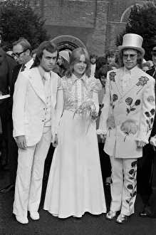 Elton John (right) pictured here as best man to his songwriting partner Bernie Taupin