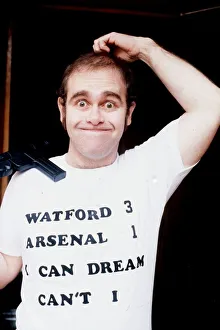 Knighthood Prints: Elton John singer scratching head Watfor 3 Arsenal 1 t shirt I can dream can t I