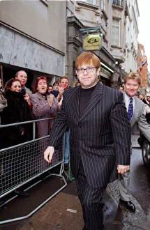Elton John Singer / Songwriter attending the sale of his old cloths with the profits going