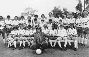 Knighthood Prints: Elton John superstar and members of the England football team pose with schoolchildren in