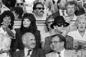 Pianist Prints: Elton John and his wife Renate watching the Watford v Tottenham Hotspur match
