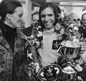 Emerson Fittipaldi wins the British Grand Prix at Brands Hatch stands with wife Marina