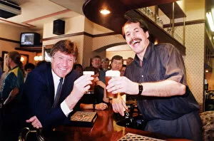 00559 Collection: Emlyn Hughes with Jim Holton, Landlord of The Stag, Bishop Street, Coventry