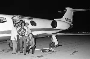 Engelbert Humperdinck arrives by private jet for a darts match. 25th July 1973