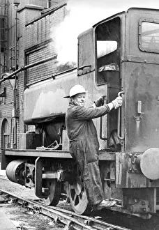 Engine driver Bill Marker taking his last trip in the saddle tank engine he