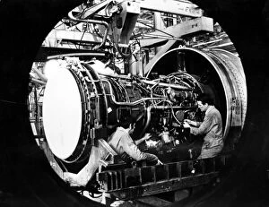00879 Collection: Engineers work on a Pratt and Whitney jet engine from Boeing 747 at Nantgarw
