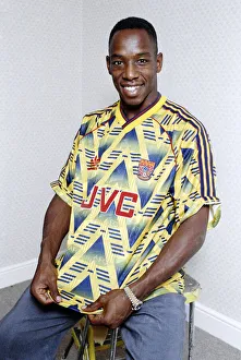 Tracksuit Prints: England and Arsenal footballer Ian Wright poses wearing his club sides away shirt