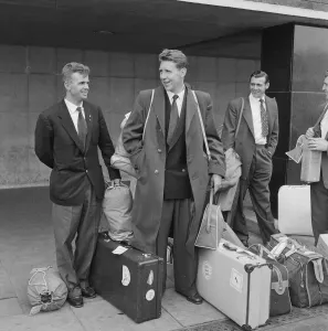 The England football squad return to London airport after being knocked out of the World