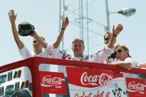 The England football team arrive at Luton airport after returning from the World Cup