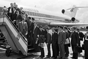 00752 Prints: The England football team board their plane as they leave London airport for Frankfurt