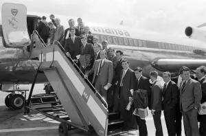 00752 Prints: The England football team board their plane as they leave London airport for Frankfurt