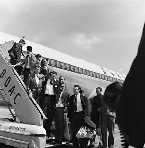 The England football team at London Airport before their flight to Santiago
