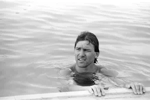 England footballer Bryan Robson relaxing in the swimming pool at the Cima Club in