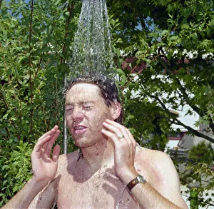England footballer Chris Waddle takes a shower to wash away Gazza