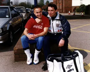 Track Suit Prints: England footballer Dennis Wise Football with manager Graham Taylor before their departure