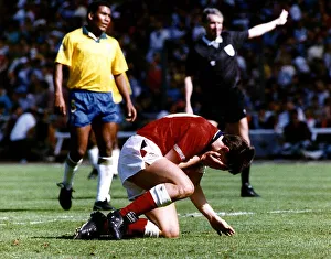 England footballer Gary Lineker reacts after miskicking his penalty