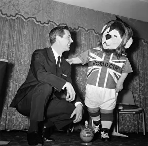 Former England footballer Johnny Haynes pictured with World Cup Willie
