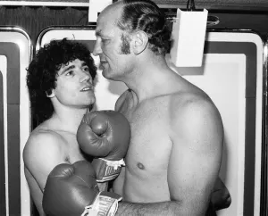 Cosmetics Prints: England footballer Kevin Keegan with former British boxer Henry Cooper
