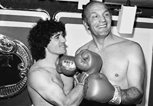England footballer Kevin Keegan with former British boxer Henry Cooper