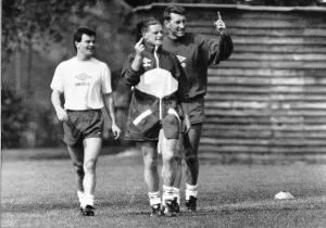 England footballer Paul Gascoigne giving the finger during a training session alongside