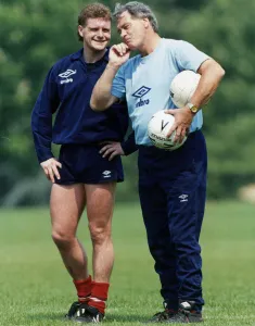 England footballer Paul Gascoigne listens to advice given by national team manager Bobby