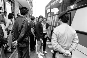 Security Prints: England footballers Paul Mariner and Graham Rix wait to board the bus at the team hotel