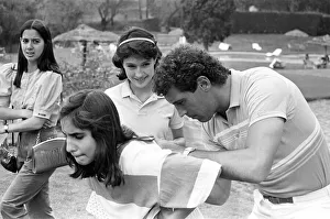 England goalkeeper Peter Shilton signs autographs for local girls in Mexico City ahead of