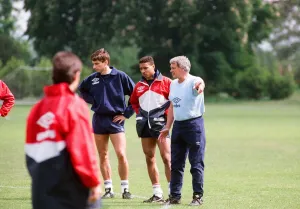 England manager Bobby Robson with Alan Smith (left) and Des Walker as he takes charge of