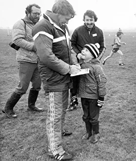 England manager Bobby Robson obliges a young fan in Newcastle