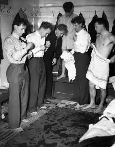 England Rugby League players getting changed in the changing room after a match