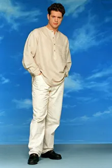 England rugby player Kieran Bracken modeling cloths in studio, February 1996