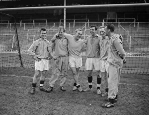 England team members to play Russia stand together during a training session at White