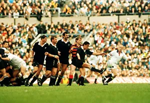 00004 Prints: England v New Zealand Rugby Union match at Twickenham the All Blacks clear the ball