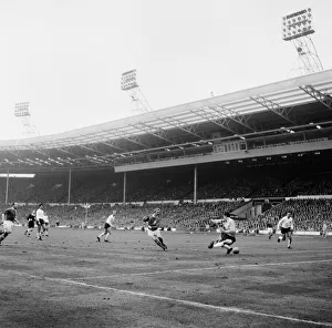 Scoring Prints: England v Rest of the World Team at Wembley Stadium Denis Law scoring a goal