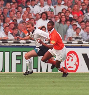 Englands Alan Shearer and Hollands Winston Bogarde battle for the ball during the England