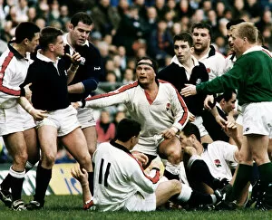 Images Dated 18th October 2012: Englands Brian Moore lashes out at Craig Chalmers of Scotland as team mates try