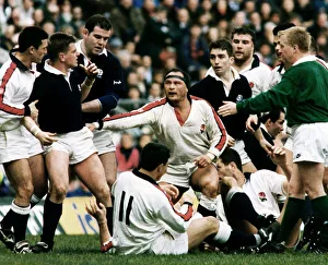 00268 Prints: Englands Brian Moore lashes out at Craig Chalmers of Scotland as team mates try