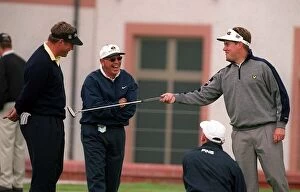 Images Dated 13th July 1999: Englands Lee Westwood pokes his putter into Darren Clarke