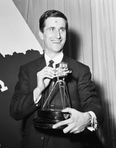 00269 Prints: English cyclist Tommy Simpson receives the 1965 Sports Personality of the Year trophy