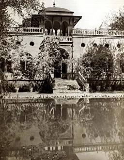 Reflections Prints: The English Embassy is reflected in the ornamental lake in Tehran Architecture