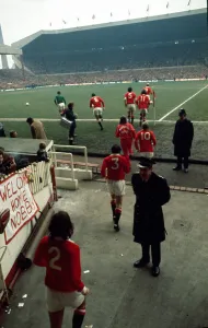 English FA Cup match at Old Trafford The United team walk onto the pitch at Old