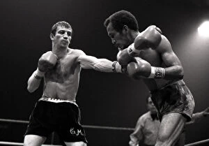 00021 Collection: English flyweight boxer Charlie Magri in action during his fight against Eleoncio