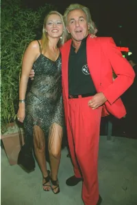 English Nightclub owner Peter Stringfellow with Claire Leng at the new Home nightclub in
