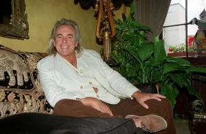 Trousers Prints: English nightclub owner Peter Stringfellow at home relaxing. September 1998