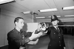 Points Prints: English police officers tour a firing range at a New York Police Department in America