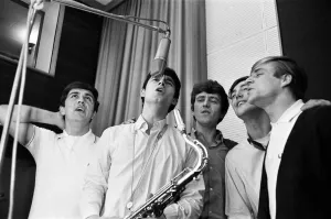 Beat Prints: The English pop rock group, Dave Clark Five singing in a recording studio