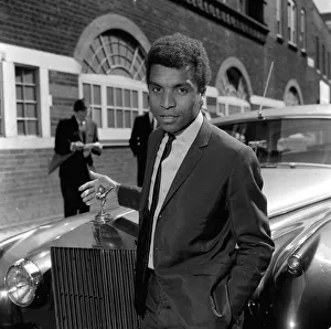 Hearing Prints: English pop singer Kenny Lynch outside Bow Street Magistrate Court awaiting a hearing