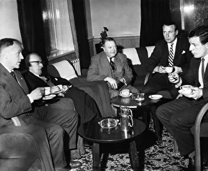 Enjoying the afternoon tea in the lounge of a Blackpool hotel are left to right Mr