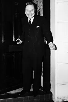 Images Dated 7th February 1974: Enoch Powell Conservative MP outside front door 1974